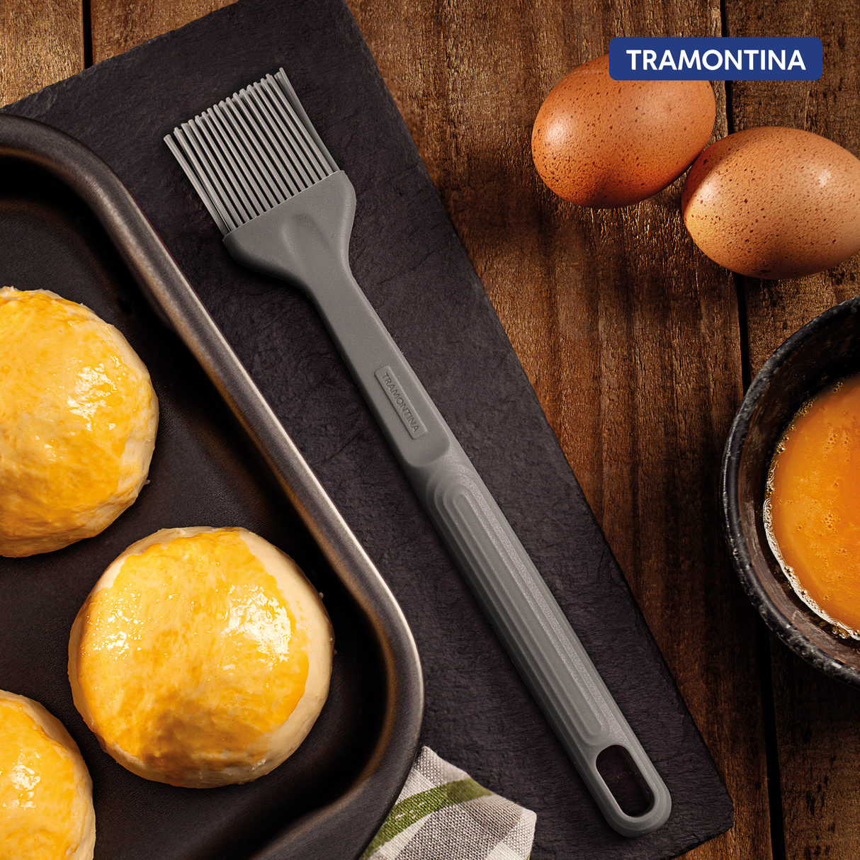 Grey Softta Silicone Brush by Tramontina India, featuring soft silicone bristles and ergonomic handle for gentle cleaning.