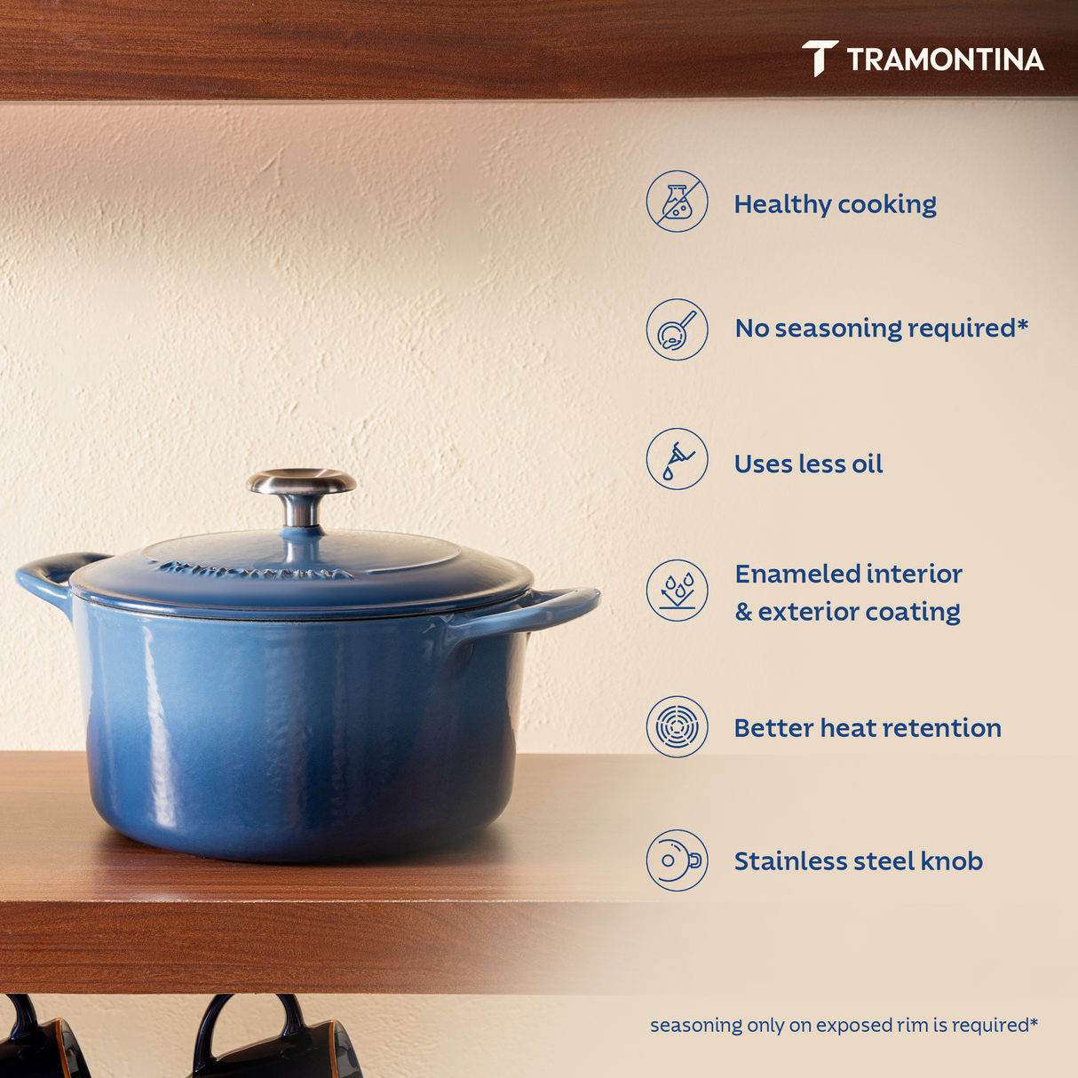 Tramontina India Bestow enameled cast iron round Dutch oven in medium blue, 6.1L casserole with lid and handles on a kitchen countertop.