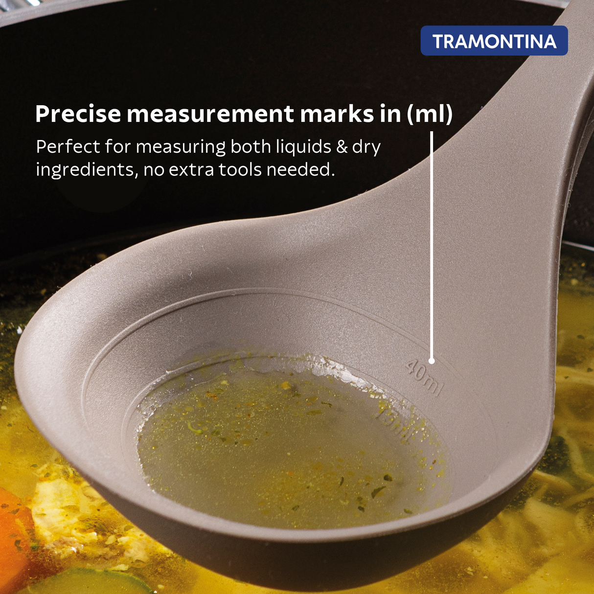 Grey Softta Silicone Ladle by Tramontina India, showing a heat-resistant kitchen utensil with a silicone handle and rounded scoop.