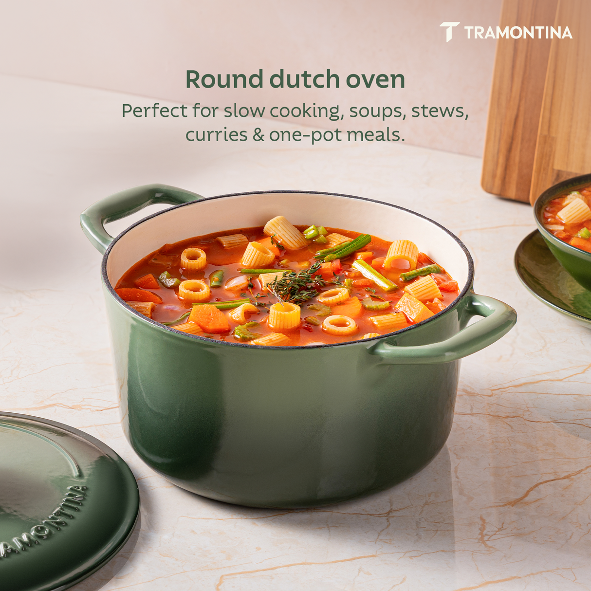 Tramontina India Bestow enameled cast iron round Dutch oven in cactus green, 6.1L, with sturdy handles and smooth enamel finish.