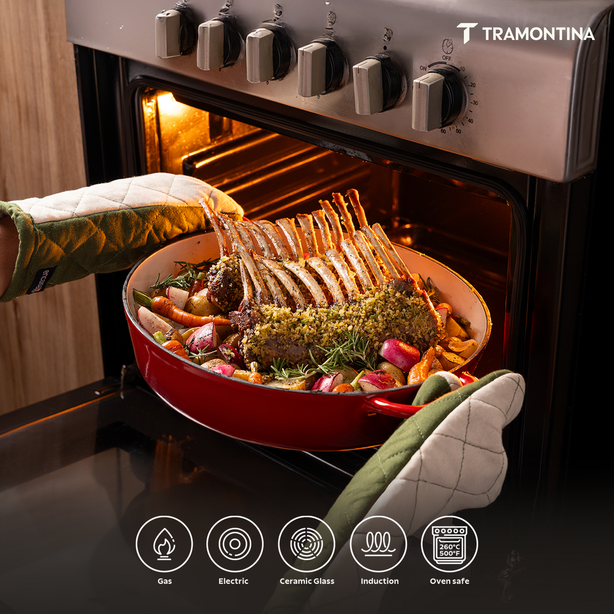Tramontina India Bestow enameled cast iron oval Dutch oven in gradated red, 5.2L, shown with lid and sturdy handles.