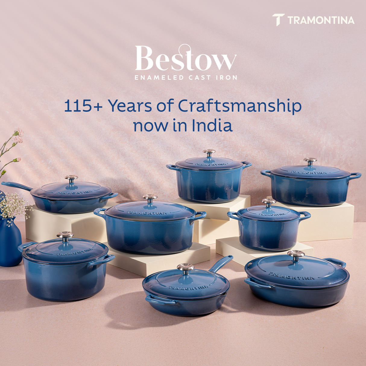 Medium blue enameled cast iron round braiser by Tramontina India, 3.8L, with a smooth enamel finish and sturdy handles.