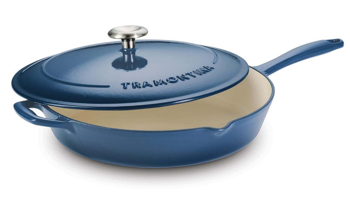 Tramontina India Bestow enameled cast iron covered skillet in medium blue, 25cm size, with a lid and sturdy handles.