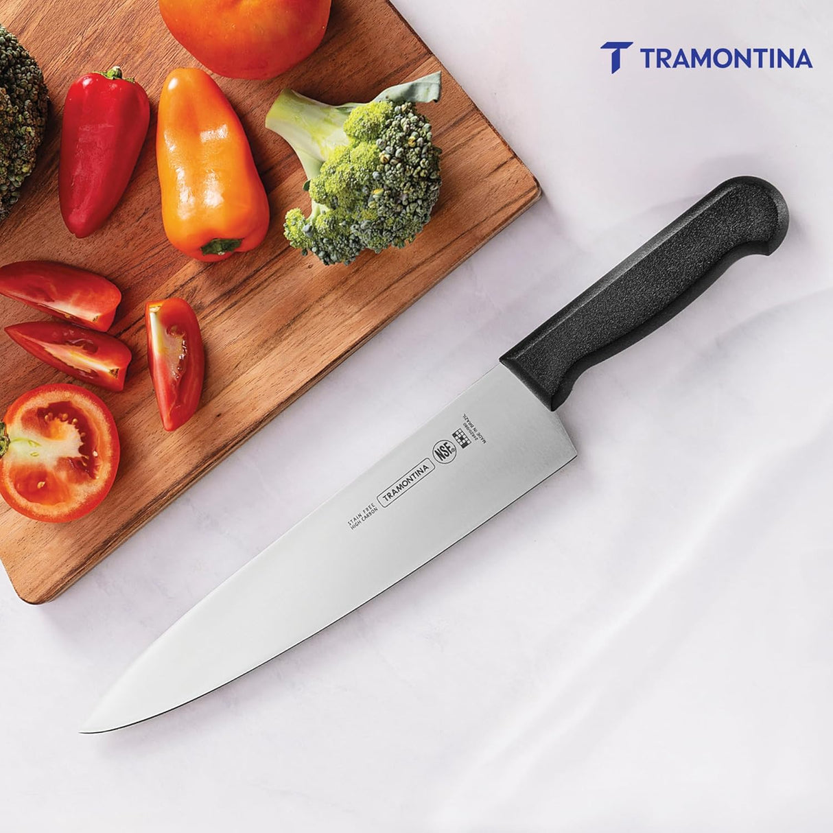 Black 20 cm Tramontina India professional chef's knife, sharp stainless steel blade for precise meat and kitchen cutting tasks.