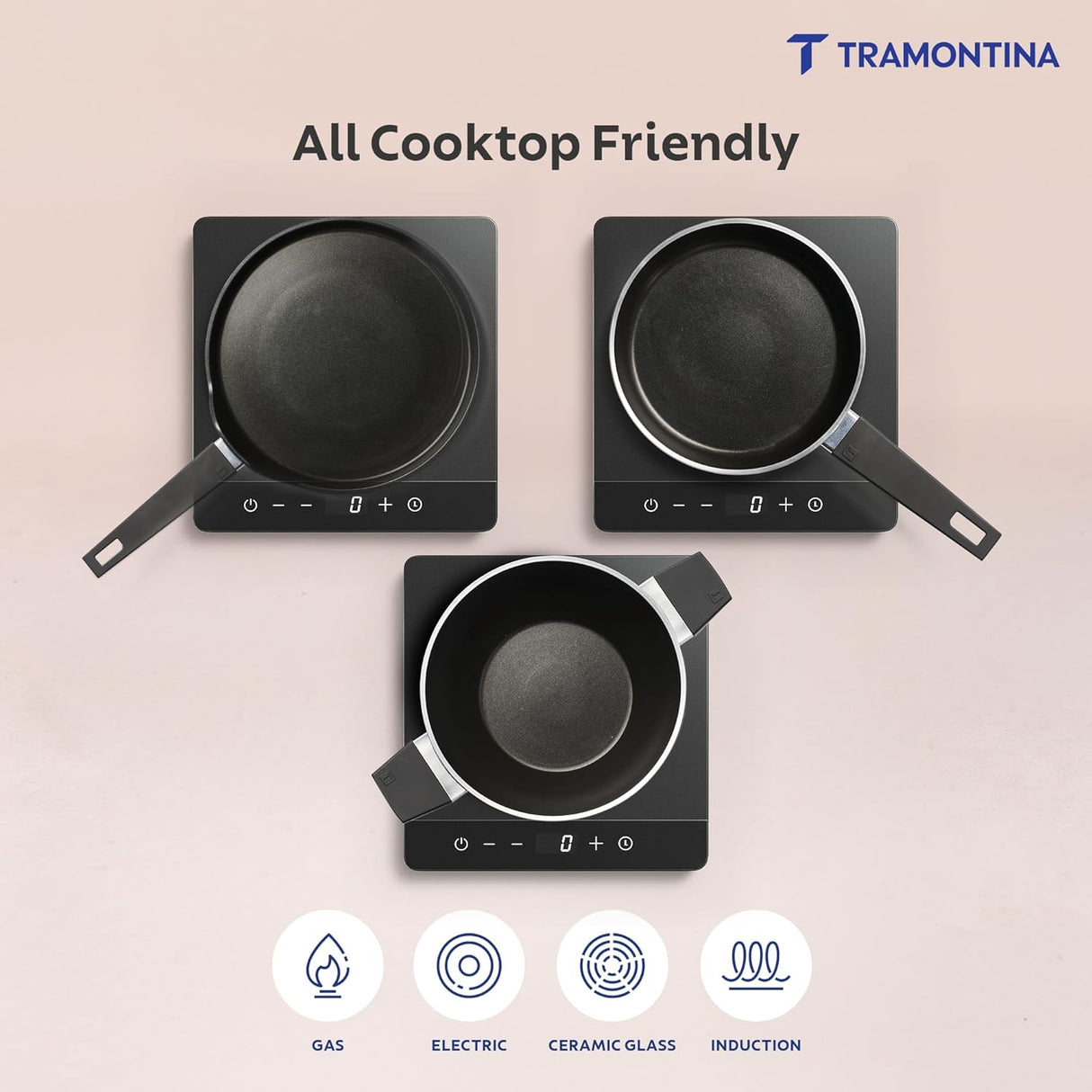 Set of four grey Tramontina India Chroma Forged CK cookware, including 20cm fry pan, 28cm DosaTawa, and 22cm Kadai.