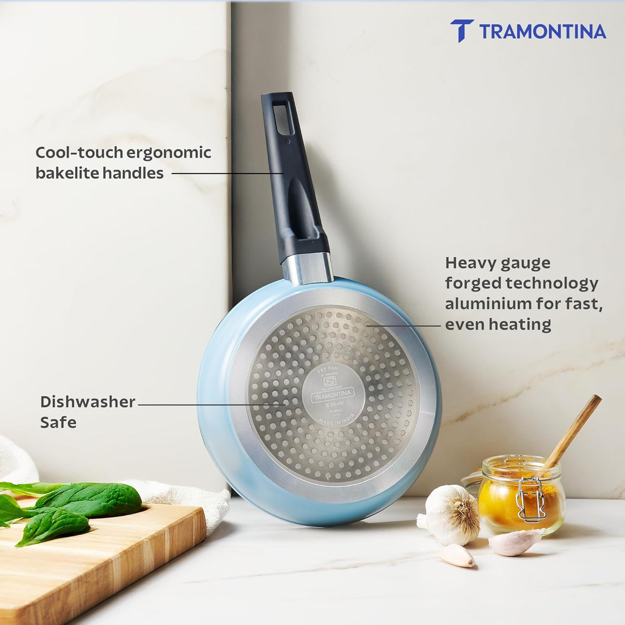 Blue Tramontina India Aura 20cm non-stick ceramic fry pan with reinforced coating in blueberry color, suitable for versatile cooking.