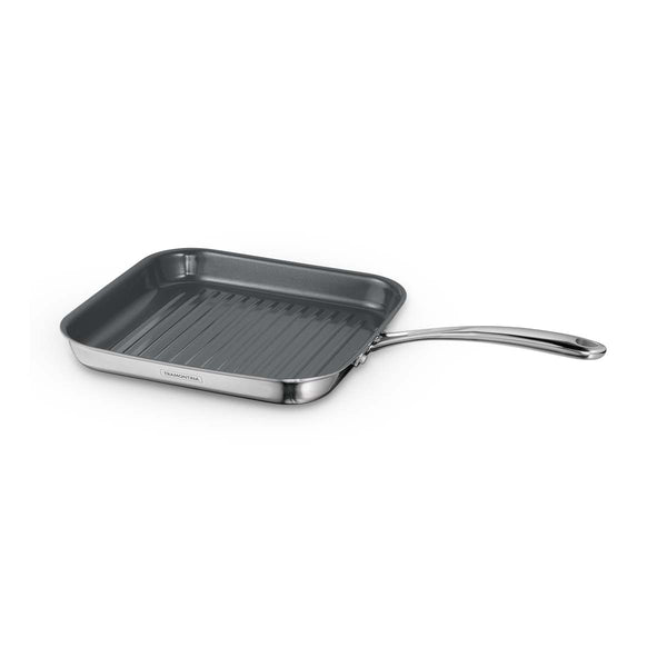 Tramontina India Fusao EX+ 26cm ceramic stainless steel tri-ply grill pan with ridged cooking surface and sturdy handle.