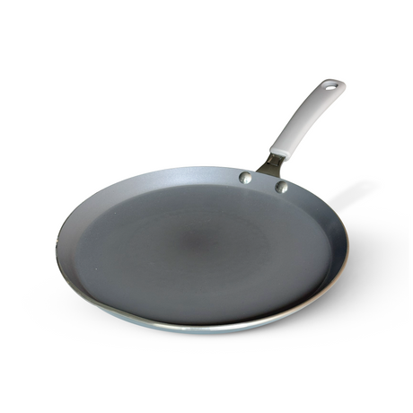Blue Tramontina Stella Dosa Tawa, 28 cm non-stick skillet for making dosas and pancakes, with a smooth cooking surface.