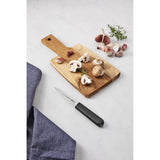 Black Tramontina India professional 7 cm vegetable paring knife with a sharp blade for precise peeling and slicing.