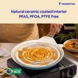 Tramontina Spectra Forged Dosa Tawa 28 cm with non-stick surface and wooden handle for easy cooking and flipping.