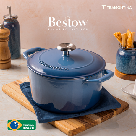 Tramontina India Bestow enameled cast iron round Dutch oven in medium blue, 6.1L casserole with a sturdy lid and handles.