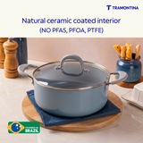 Blue Tramontina Stella Biryani Pot, 24 cm, showing a sturdy stainless steel cookware with a blue exterior and ergonomic handles.