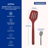 Red silicone slotted turner by Tramontina India with a flat, flexible head for flipping and serving food in the kitchen.