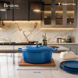 Tramontina India Bestow enameled cast iron oval Dutch oven in medium blue, 5.2L capacity, with sturdy handles and smooth enameled surface.