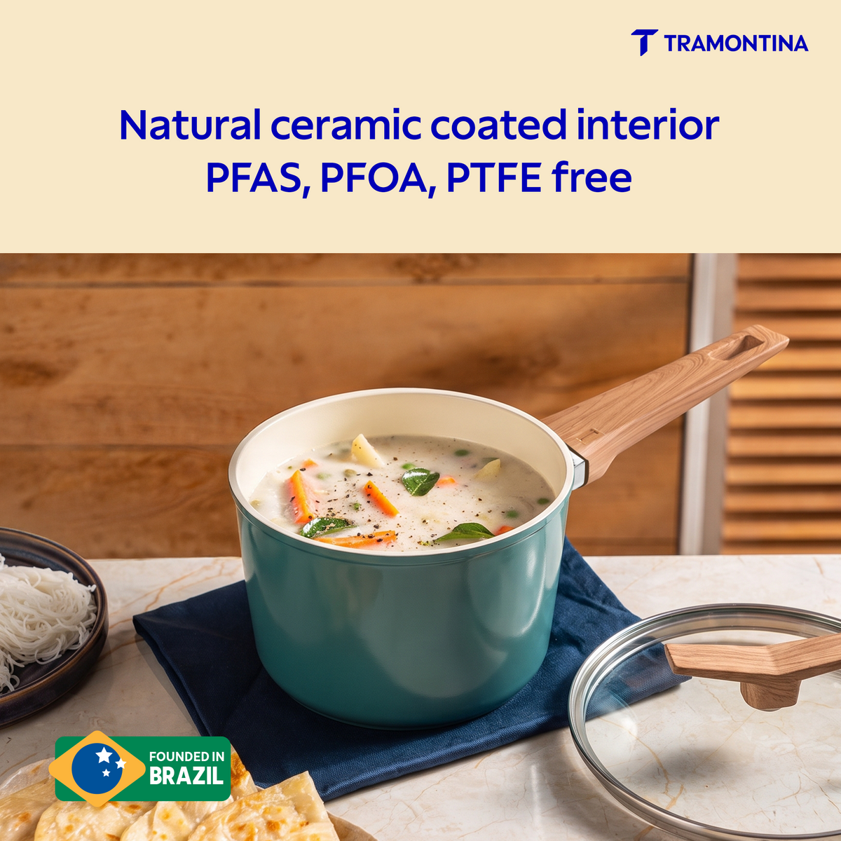 Tramontina Spectra Forged 16 cm saucepan with black handle and stainless steel body, suitable for cooking on stovetop.