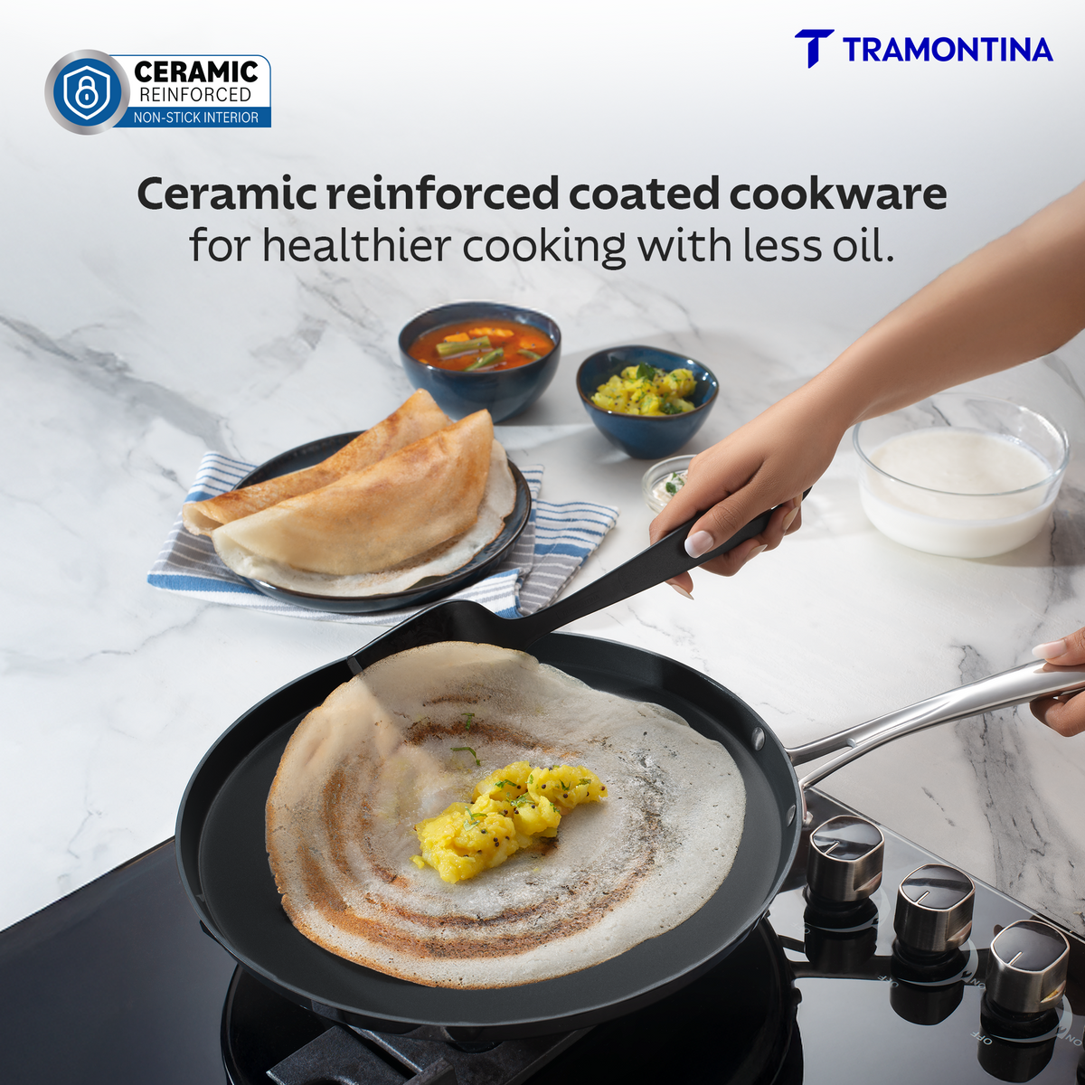 Tramontina India Fusao ceramic reinforced 28cm Dosa Tawa with 4mm thickness, non-stick cooking surface for Indian-style pancakes.