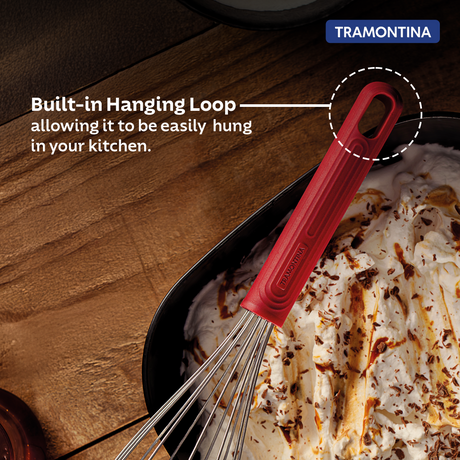 Red Softta silicone whisk by Tramontina India with a comfortable handle and flexible silicone wires for mixing and whipping.
