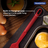 Red Softta silicone brush by Tramontina India, showing a close-up of the flexible, heat-resistant brush for cooking and baking.