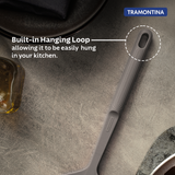 Grey Softta Silicone Skimmer by Tramontina India with a silicone handle and stainless steel mesh for efficient cooking and straining.