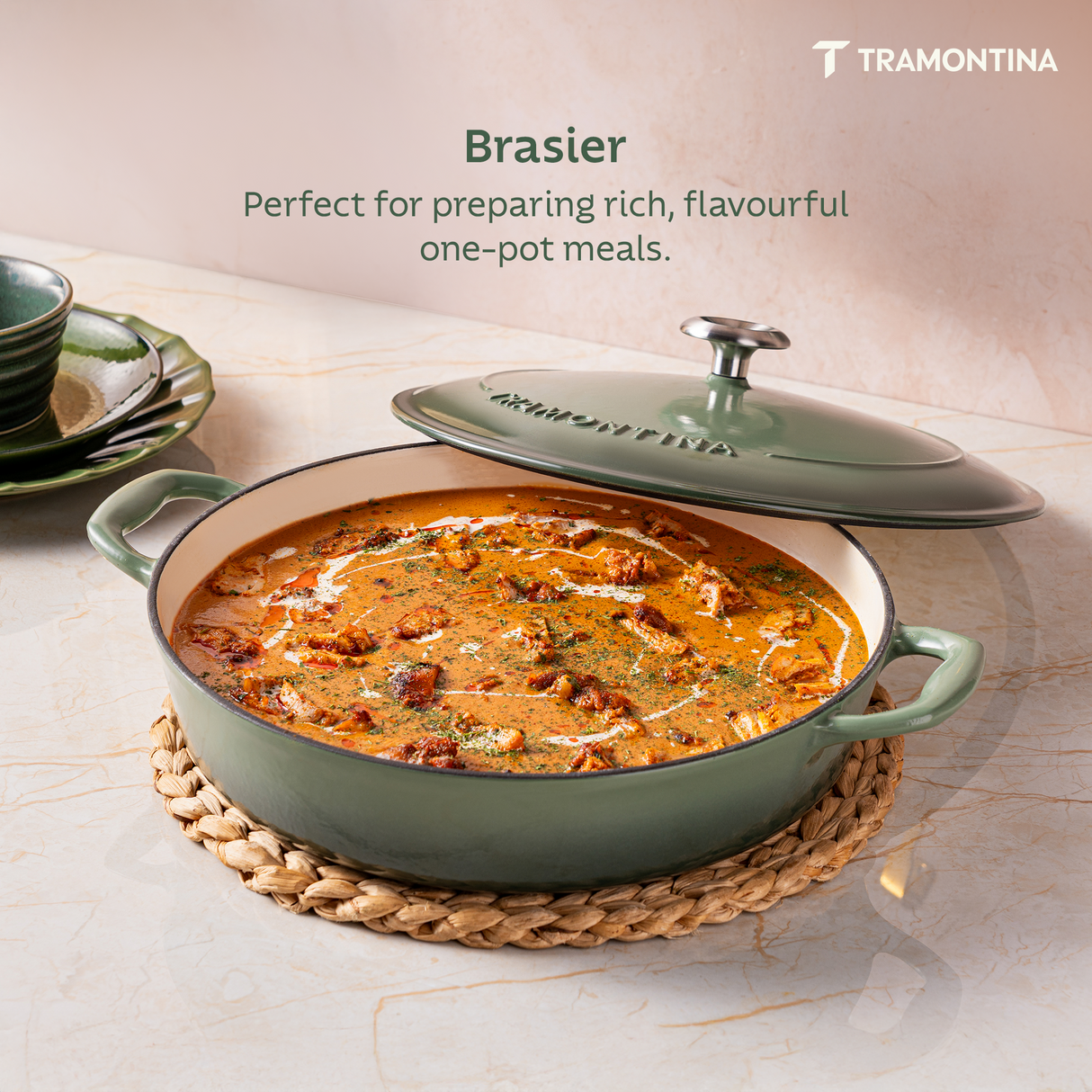 Tramontina India Bestow enameled cast iron round braiser in cactus green, 3.8L, with a glossy finish and sturdy handles.