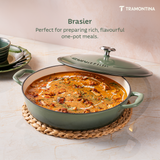 Tramontina India Bestow enameled cast iron round braiser in cactus green, 3.8L, with a glossy finish and sturdy handles.