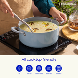 Blue Tramontina Stella Biryani Pot, 24 cm, featuring a sturdy stainless steel design and ergonomic handles for cooking.