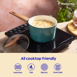 Tramontina Spectra Forged 16 cm saucepan with stainless steel handle on a stovetop, showcasing its sleek cookware design.