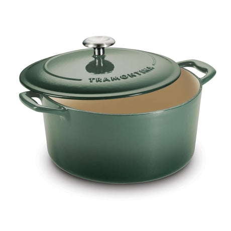 Tramontina India Bestow enameled cast iron round Dutch oven in cactus green, 6.1L casserole pot with lid on a kitchen countertop.