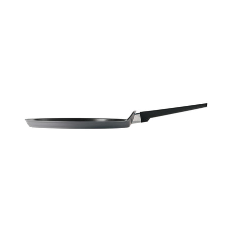 Tramontina India 28 CM grey dosa tawa with a smooth surface, ideal for making perfect dosas on any stovetop.