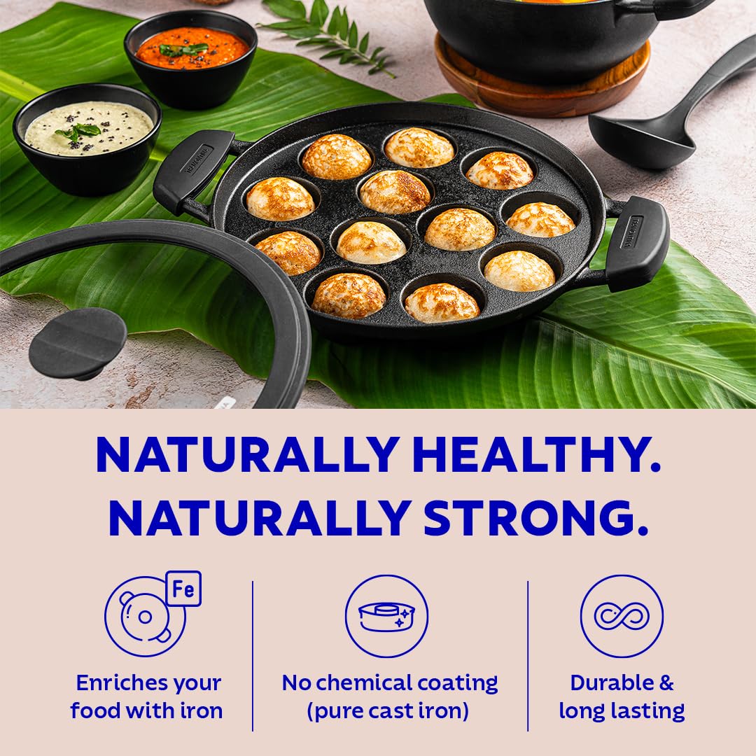 Tramontina India Titanex 26cm pre-seasoned cast iron paniyaram pan with 12 pits, showcasing its sturdy design and finish.