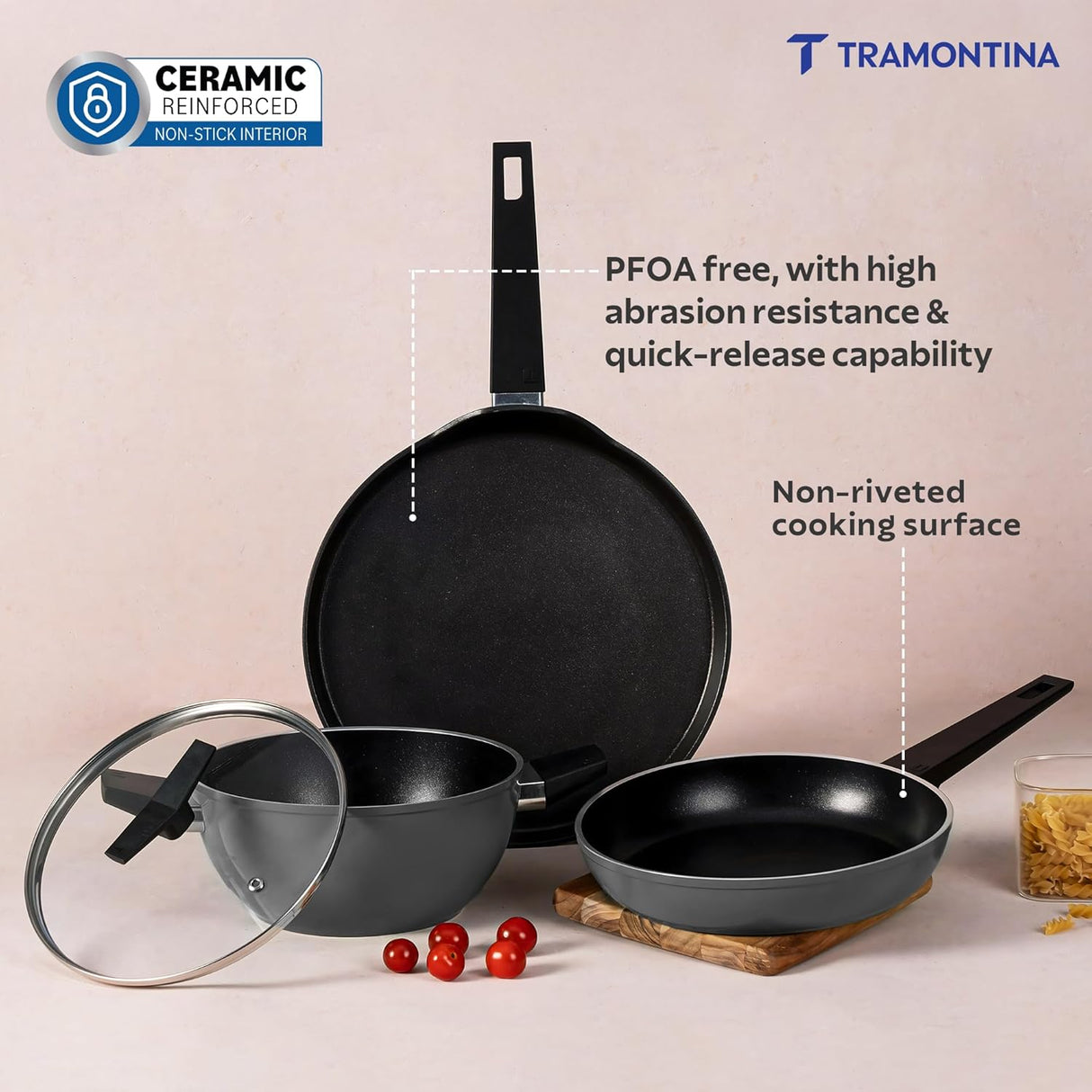 Set of four Tramontina India Chroma Forged CK cookware including 20cm fry pan, 28cm DosaTawa, and 22cm Kadai in grey.