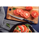 Tramontina India Century stainless steel tomato knife, 5-inch blade, designed for precise slicing of tomatoes and soft fruits.