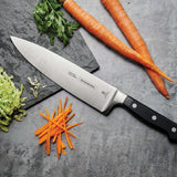 Black Century Chefs Knife by Tramontina India, 20 cm /8in, with a sleek stainless steel blade and ergonomic handle.