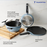 Set of four Tramontina India Chroma Forged cookware including 20cm fry pan, 28cm dosa tawa, and 22cm kadai in blue color.