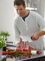 Tramontina India 7-inch stainless steel cleaver knife with a sturdy handle, ideal for chopping and heavy-duty kitchen tasks.