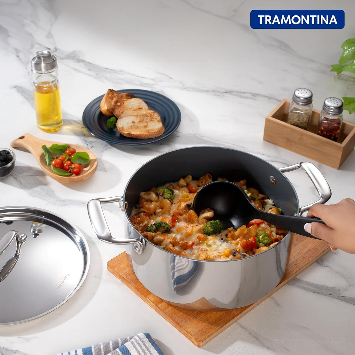 Tramontina India Fusao EX+ 20cm ceramic stainless steel tri-ply curry pot with lid, 3.1L capacity, ideal for cooking curries.