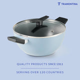 Tramontina India 22cm deep kadai in blueberry with non-stick ceramic coating and glass lid, showcasing its depth and color.