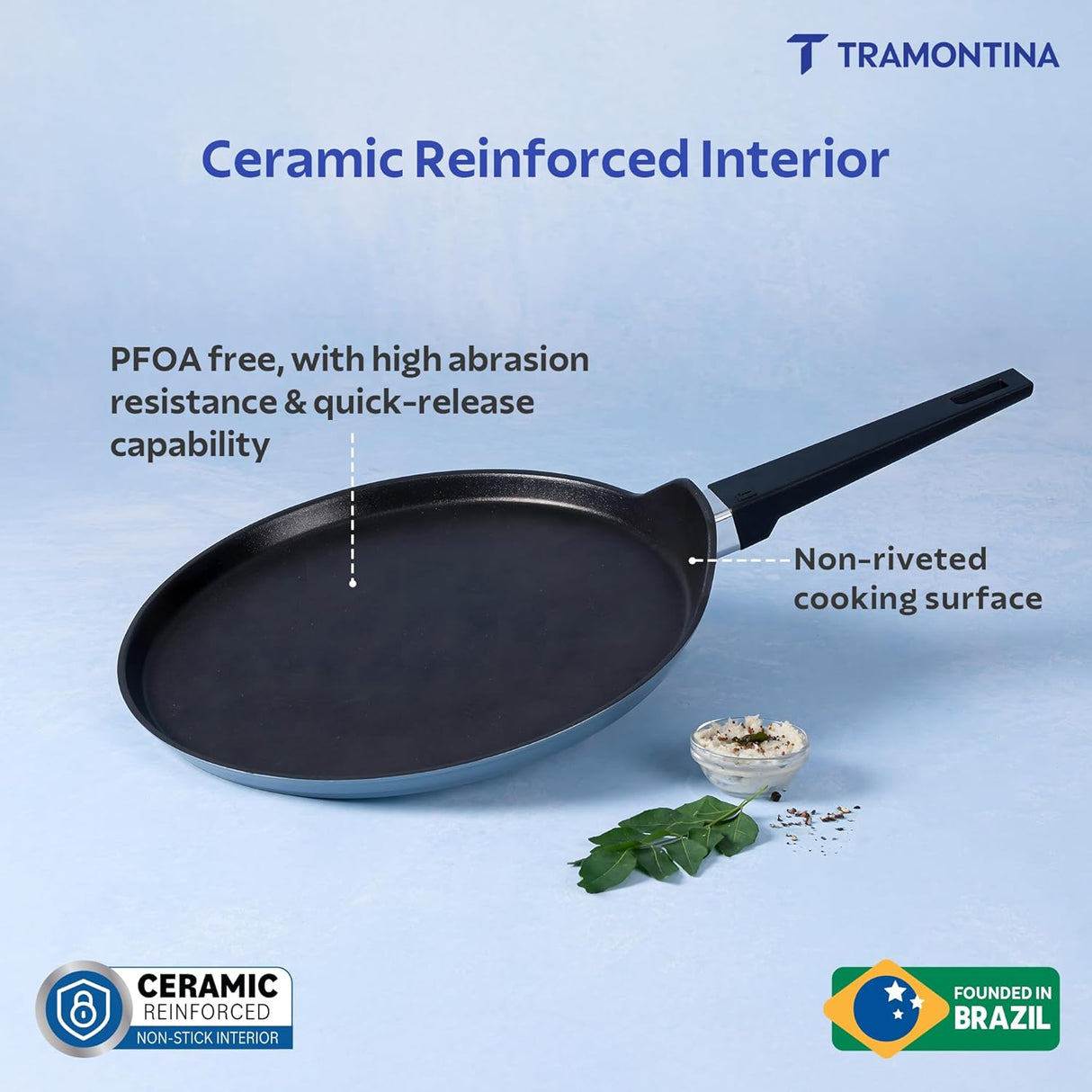 Tramontina India 28cm non-stick dosa tawa with ceramic reinforced coating in a vibrant blueberry color.