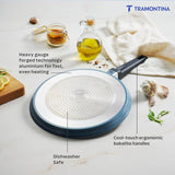 Tramontina India Aura 28cm non-stick dosa tawa with a blueberry ceramic reinforced coating on a white background.