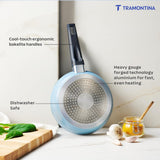 Blue Tramontina India Aura 20cm non-stick ceramic fry pan with reinforced coating in blueberry color, suitable for versatile cooking.