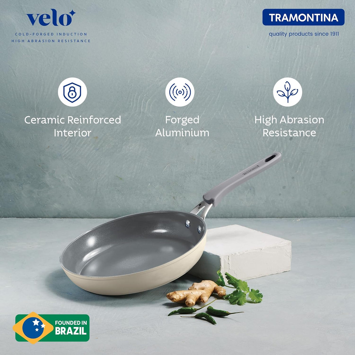 Sand-colored Velo Forged Fry Pan 20 cm by Tramontina India, showing a non-stick surface and sturdy handle.