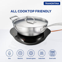 Fusao EX+ Triply Ceramic 26cm wok with stainless steel lid by Tramontina India, showing the ceramic-coated cooking surface and lid.