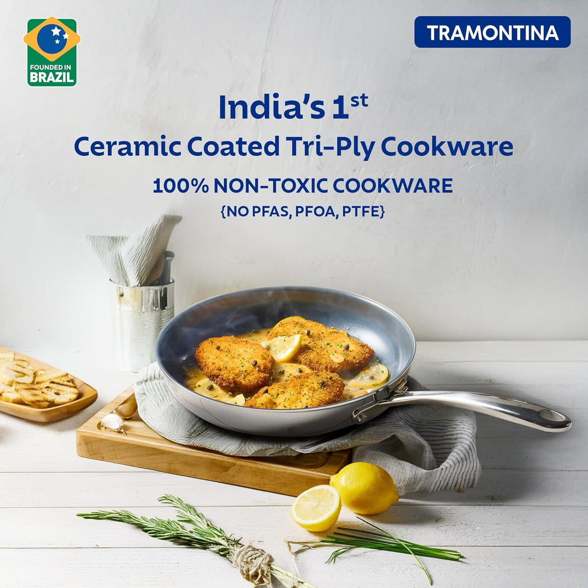Tramontina India Fusao EX+ 26cm ceramic stainless steel tri-ply fry pan with glass lid for versatile cooking.