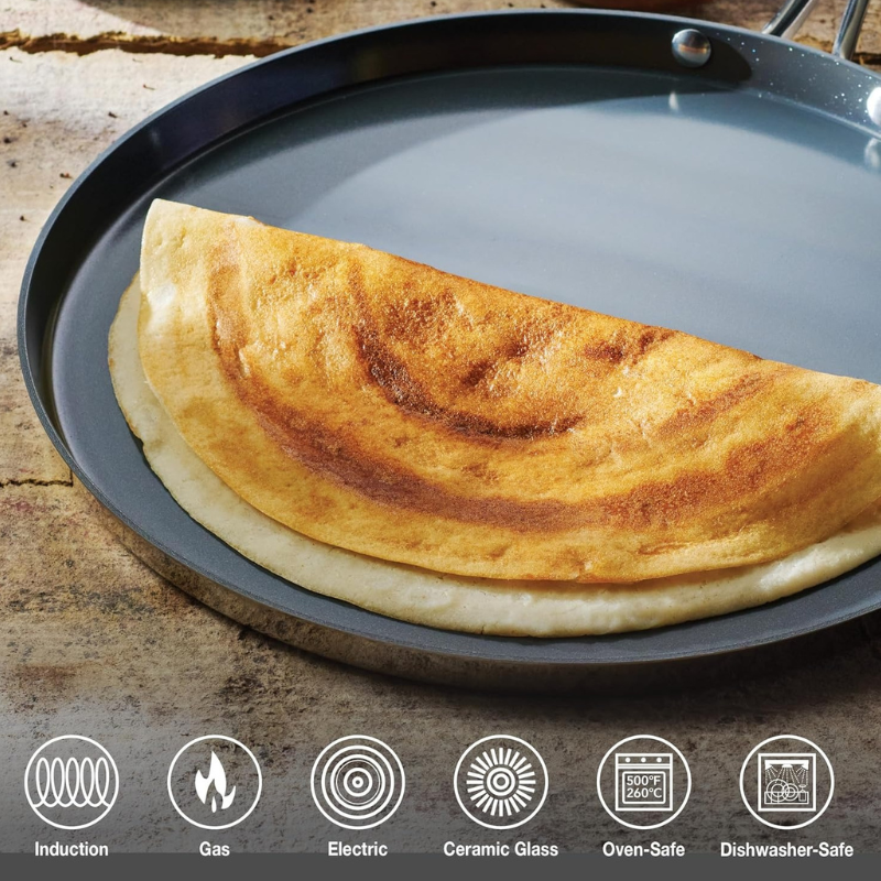 Tramontina India Fusao EX+ ceramic stainless steel tri-ply cookware set with 3.8L Kadai and 30cm Dosa Tawa on a flat surface.
