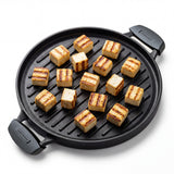 Tramontina India Titanex 30cm cast iron reversible dosa tawa and grill pan with heat-resistant silicone grip.