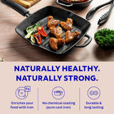 Tramontina India 27cm pre-seasoned cast iron grill pan with heat resistant silicone grip, showcasing its durable design and surface.