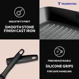 Tramontina India 27cm pre-seasoned cast iron grill pan with heat-resistant silicone grip on a wooden surface.