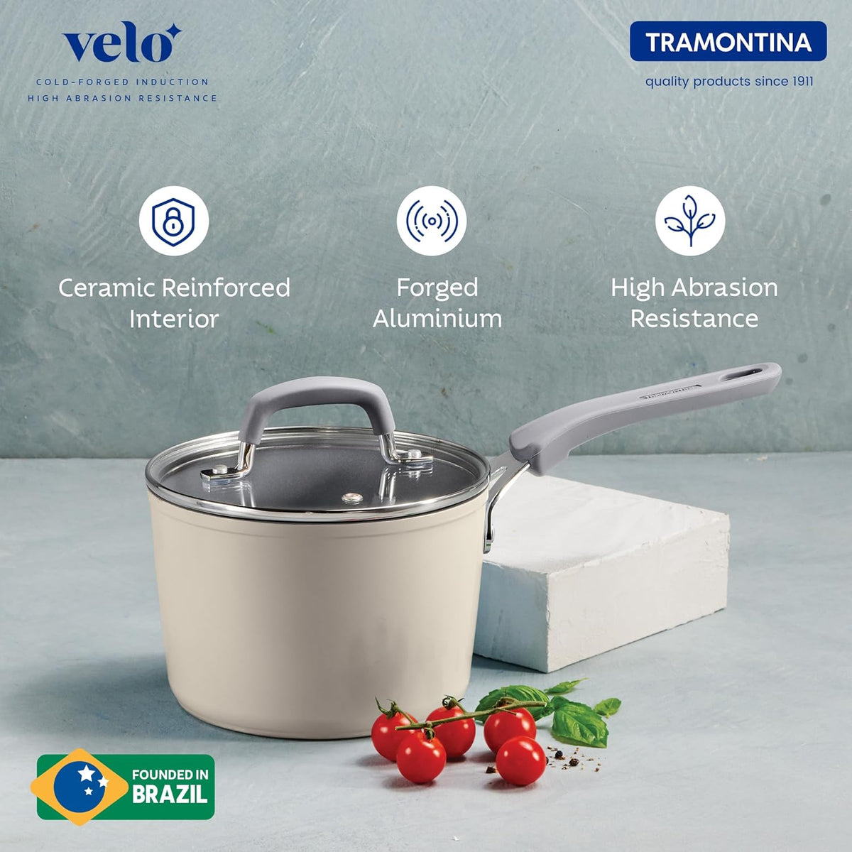 Velo Forged 16 cm sand-colored saucepan by Tramontina India with a stainless steel handle on a kitchen countertop.
