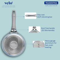 Tramontina India Velo Forged 16cm Sea Saucepan with stainless steel handle, showcasing the polished exterior and lid.