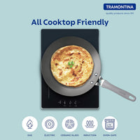 Velo Forged Concave Tawa 26 cm by Tramontina India, durable cast iron cookware for Indian cooking, showing the concave frying surface.